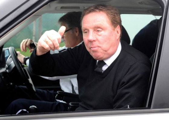 Harry-Redknapp-looks-happy-as-he-leaves-the-club-training-ground-in-Chigwell-today-amid-speculation-that-David-Beckham.jpg