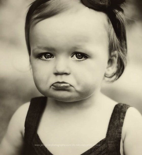 Little-Girl-Funny-Sad-Face-Photo